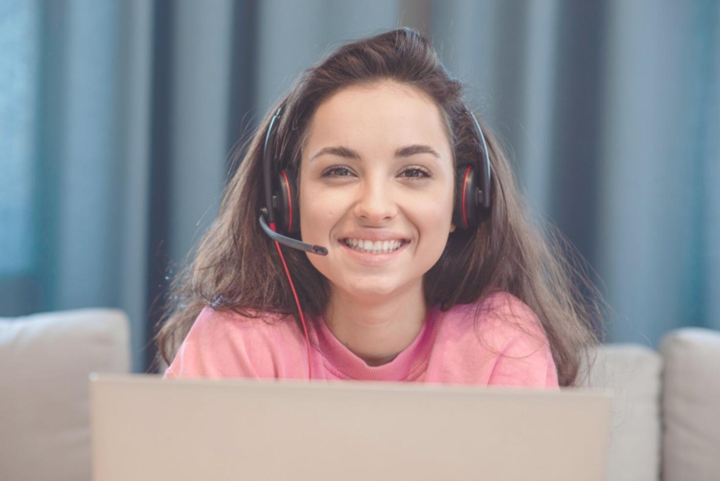 Students collaborating on IT projects in modern learning environment