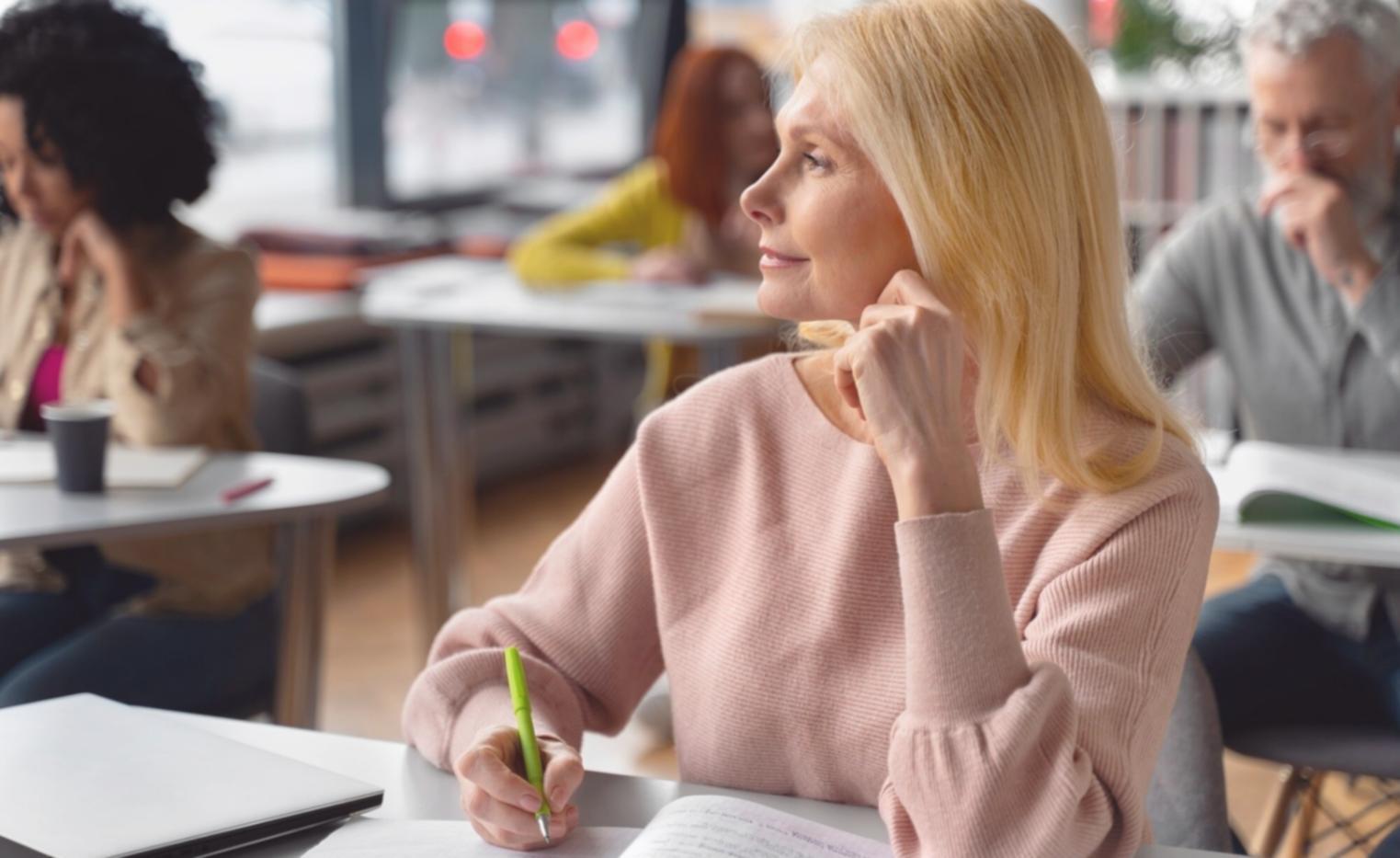 Mentor providing guidance during hands-on learning session